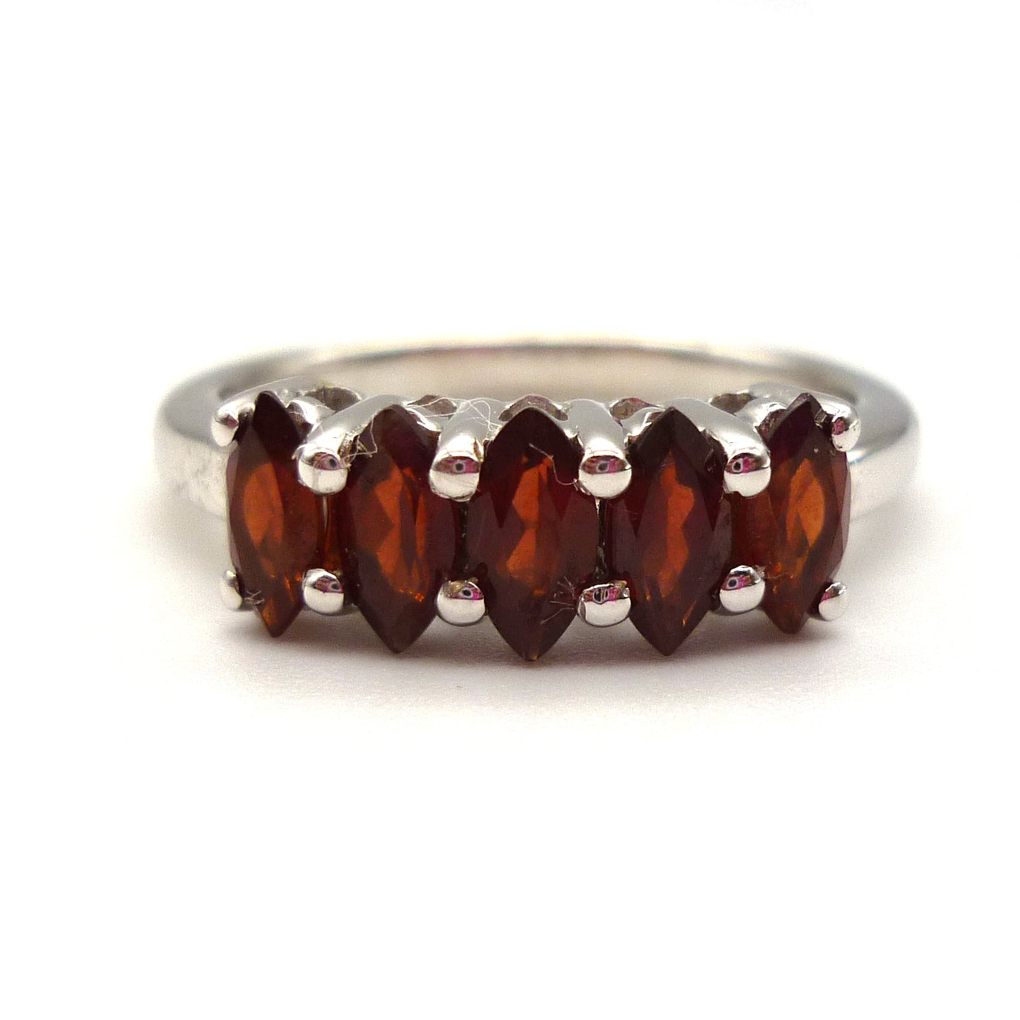 Silver Ring set with 5 Orange Toned Garnets