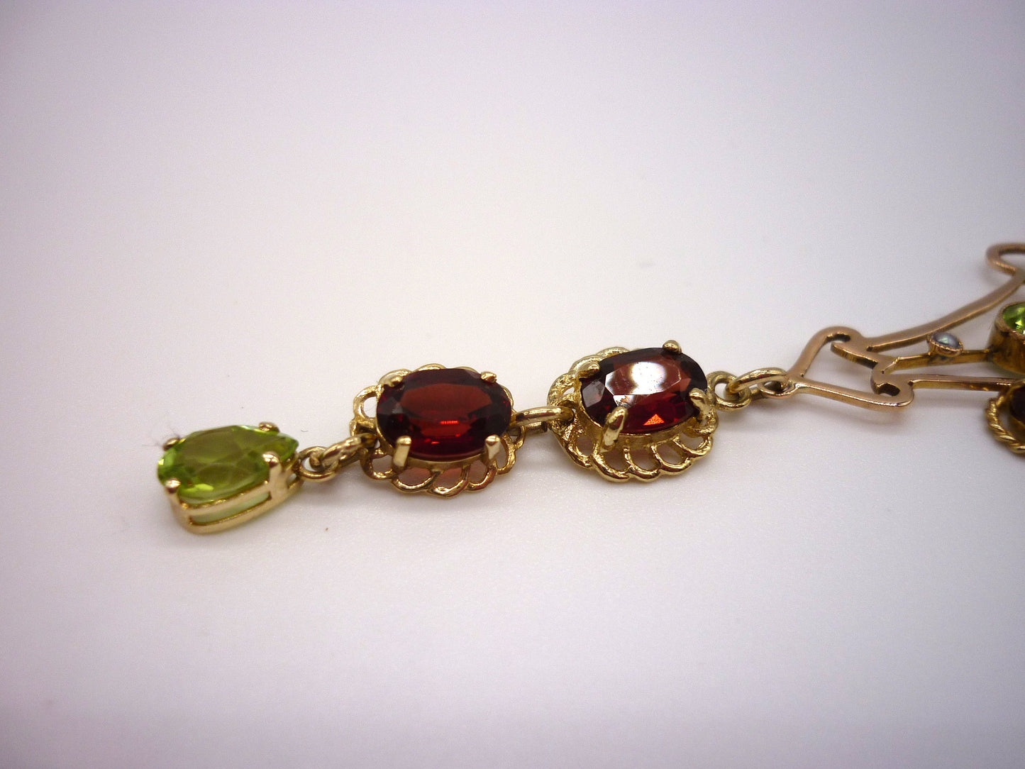 Antique Lavalier Pendant set with Garnets & Peridots on a Long Gold Belcher Chain