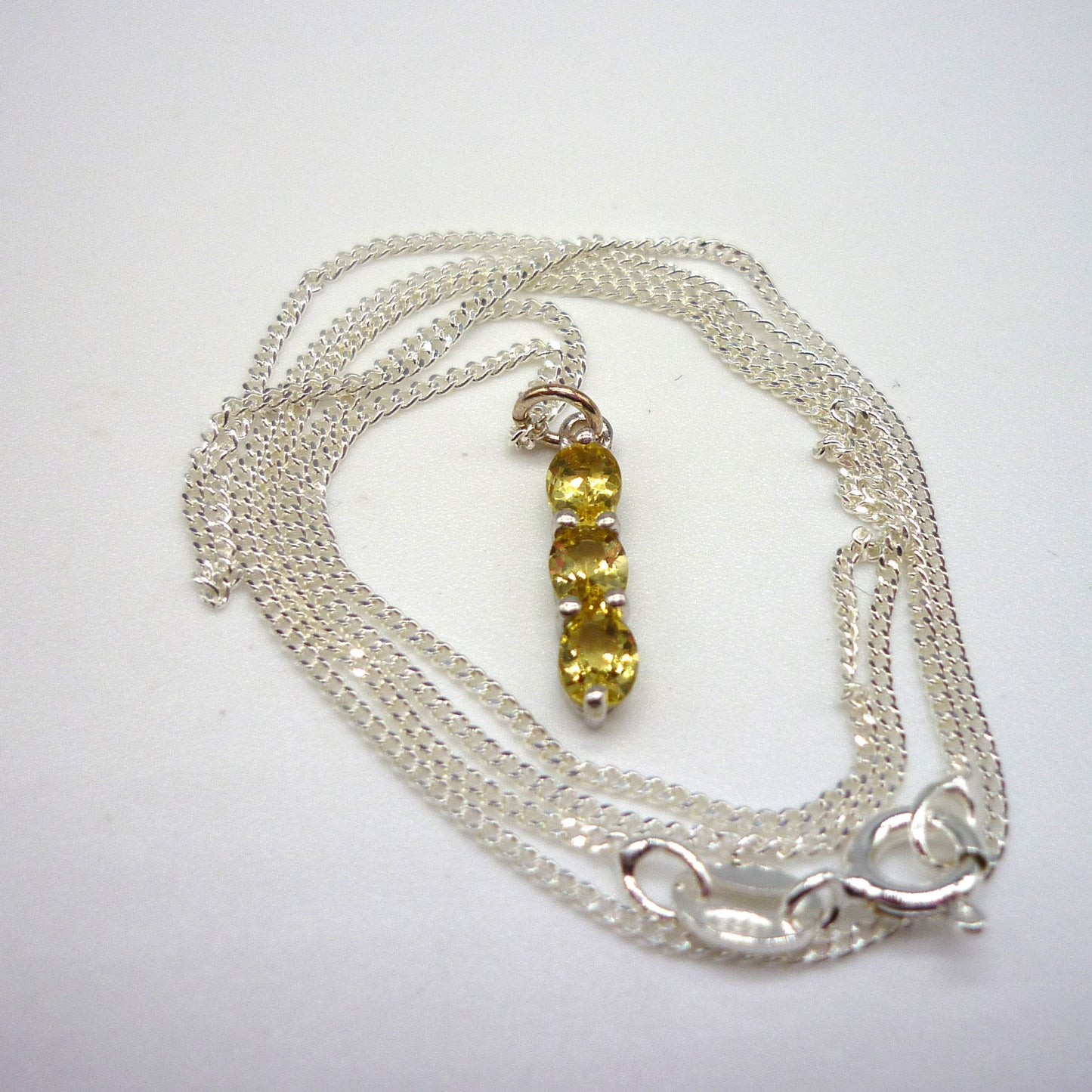 Dainty Silver Pendant set with Yellow Gemstones on a Thin Silver Chain
