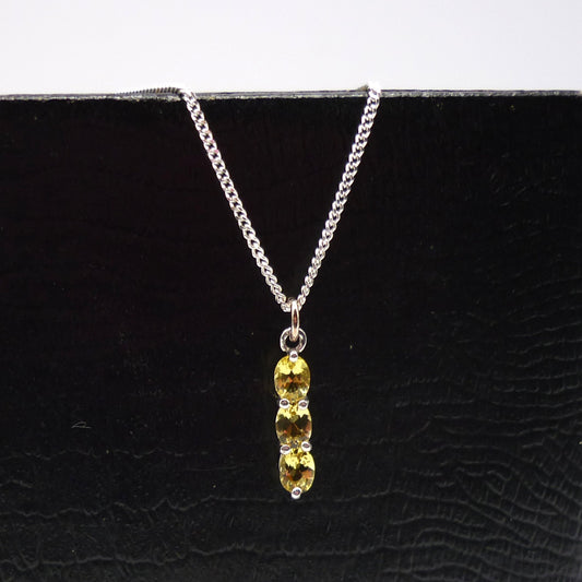 Dainty Silver Pendant set with Yellow Gemstones on a Thin Silver Chain