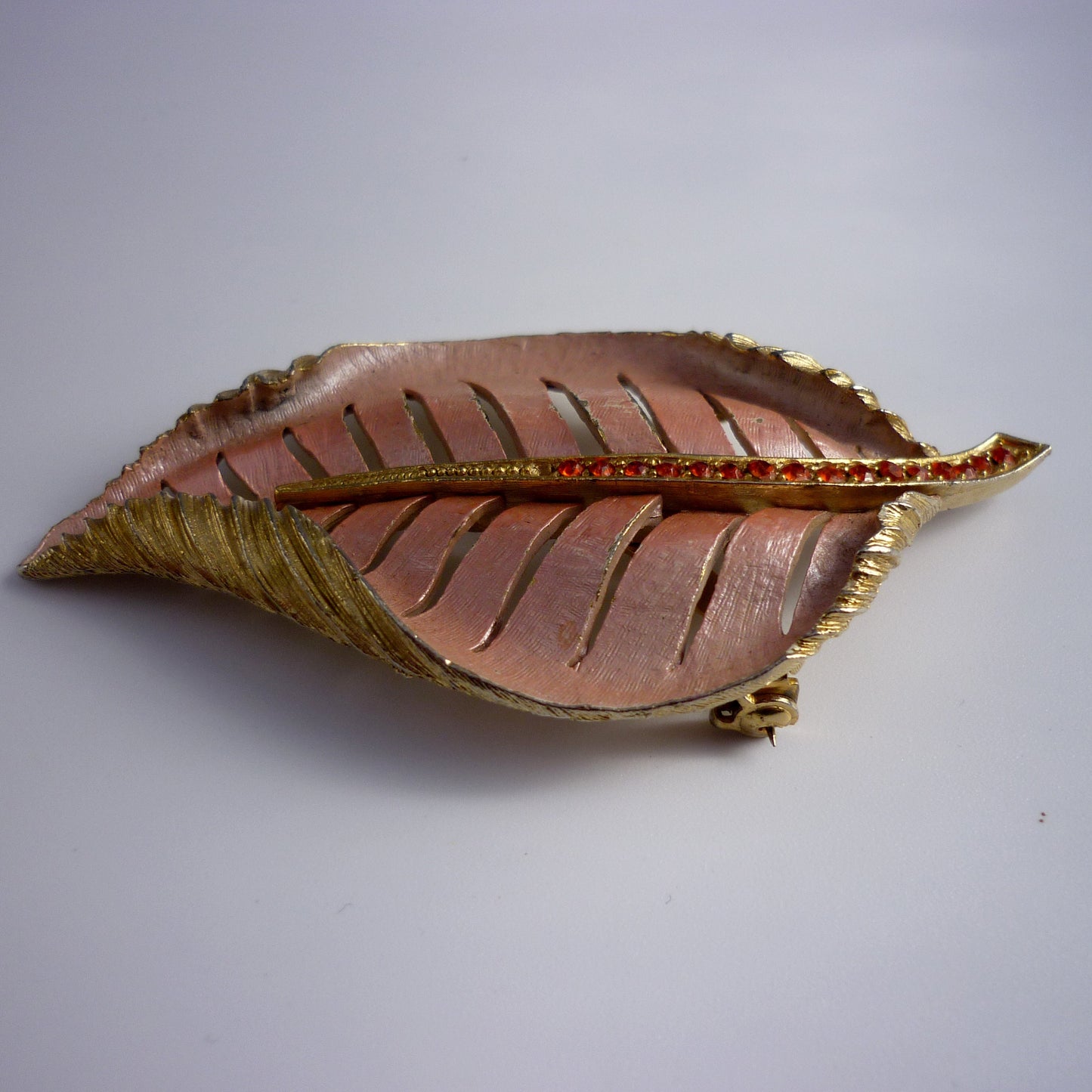 Large Pink Enamel on Gold Leaf Brooch set with Red Stones