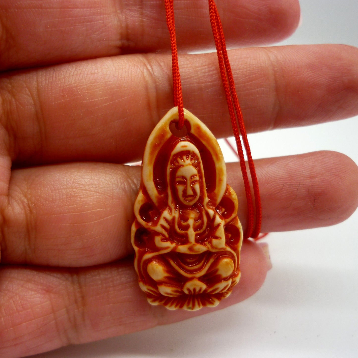 Carved Kuan Yin Pendant on Red Cord