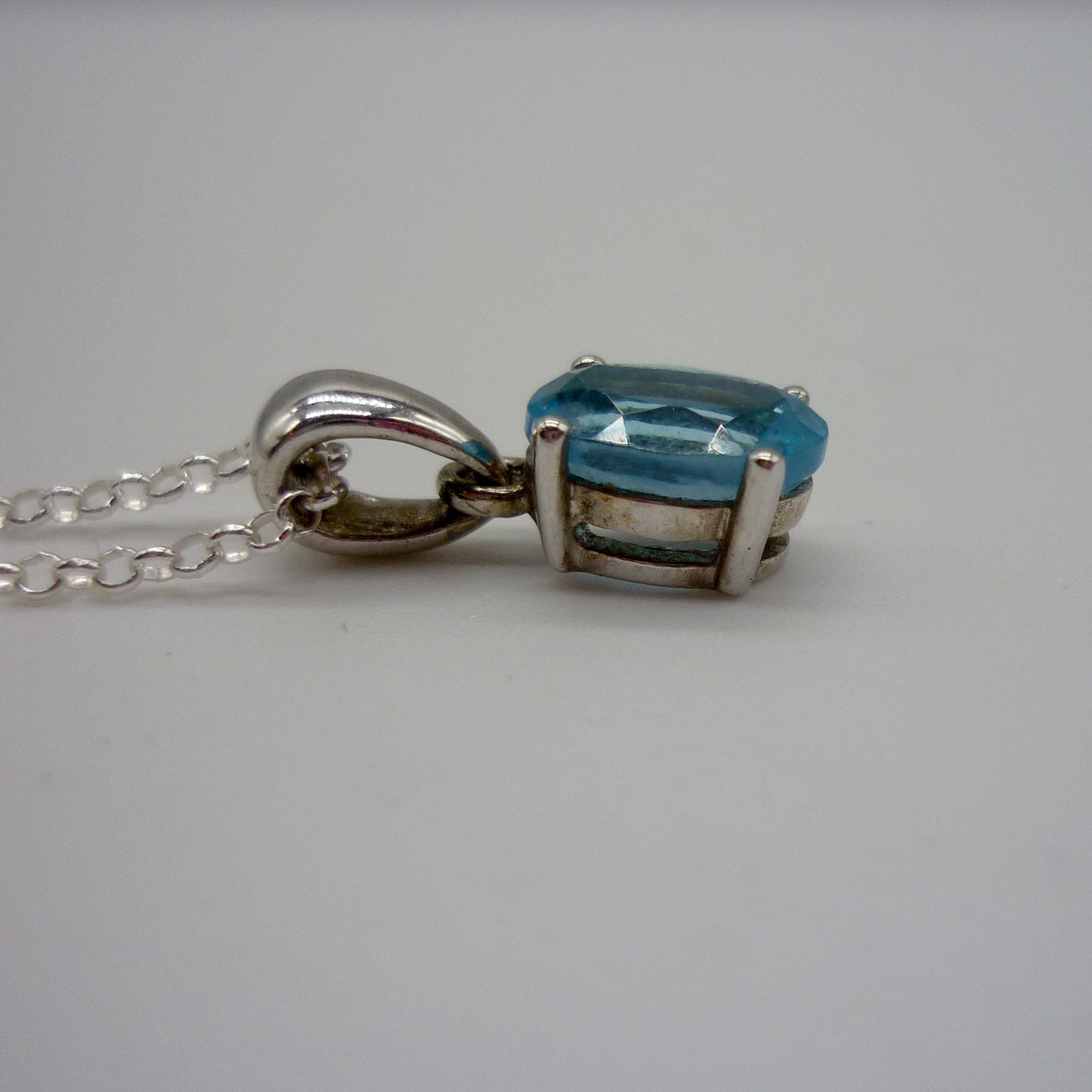 Dainty Silver Pendant set with Blue Gemstone on a Narrow Silver Chain