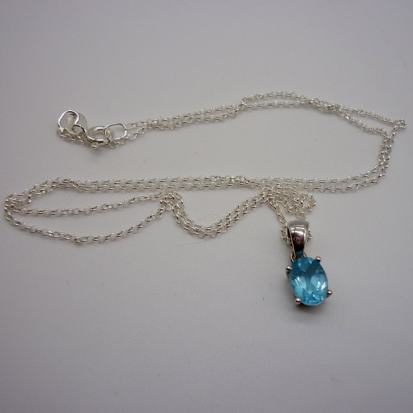 Dainty Silver Pendant set with Blue Gemstone on a Narrow Silver Chain