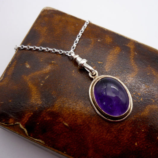 Amethyst Cabochon Pendant on a Long Silver Belcher Chain with Small Albert Clasp