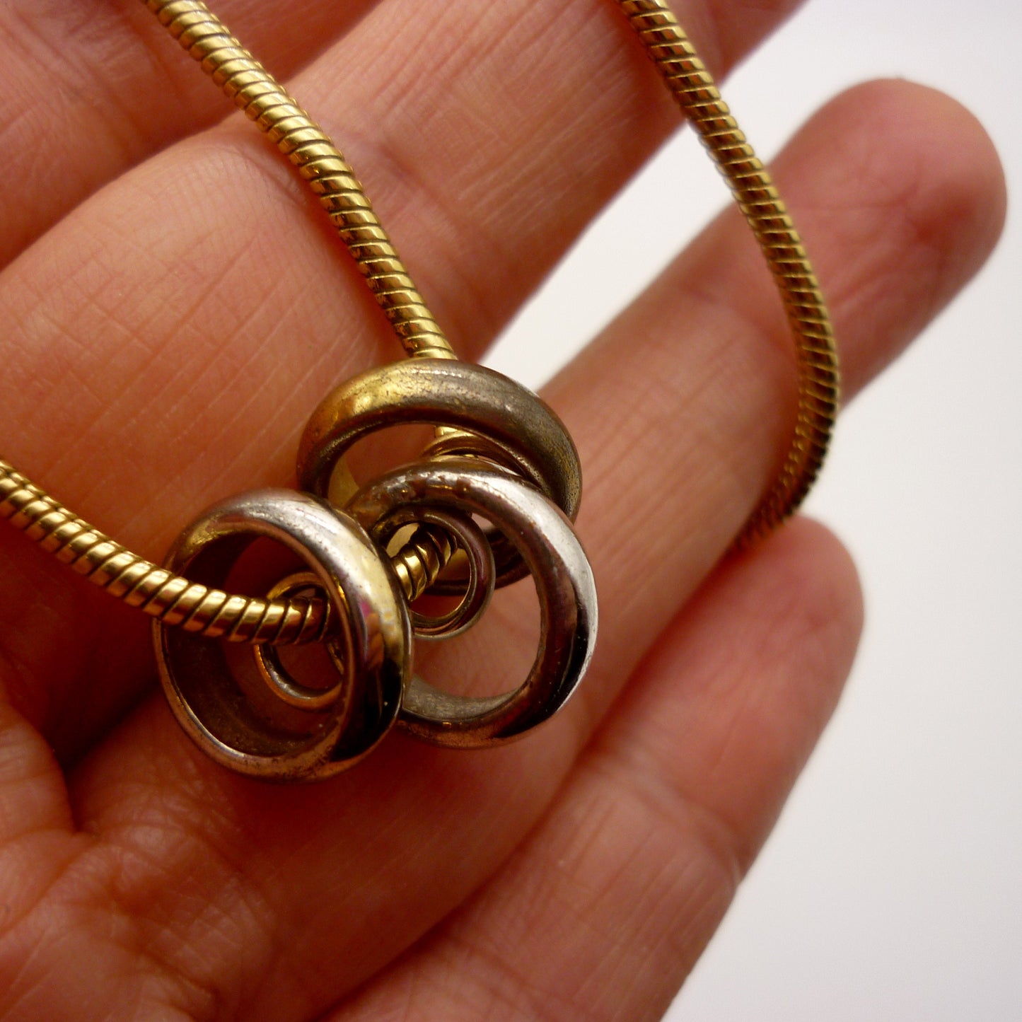 Vintage Gold Tone Snake Chain with Bronze, Silver and Gold Ring Pendants