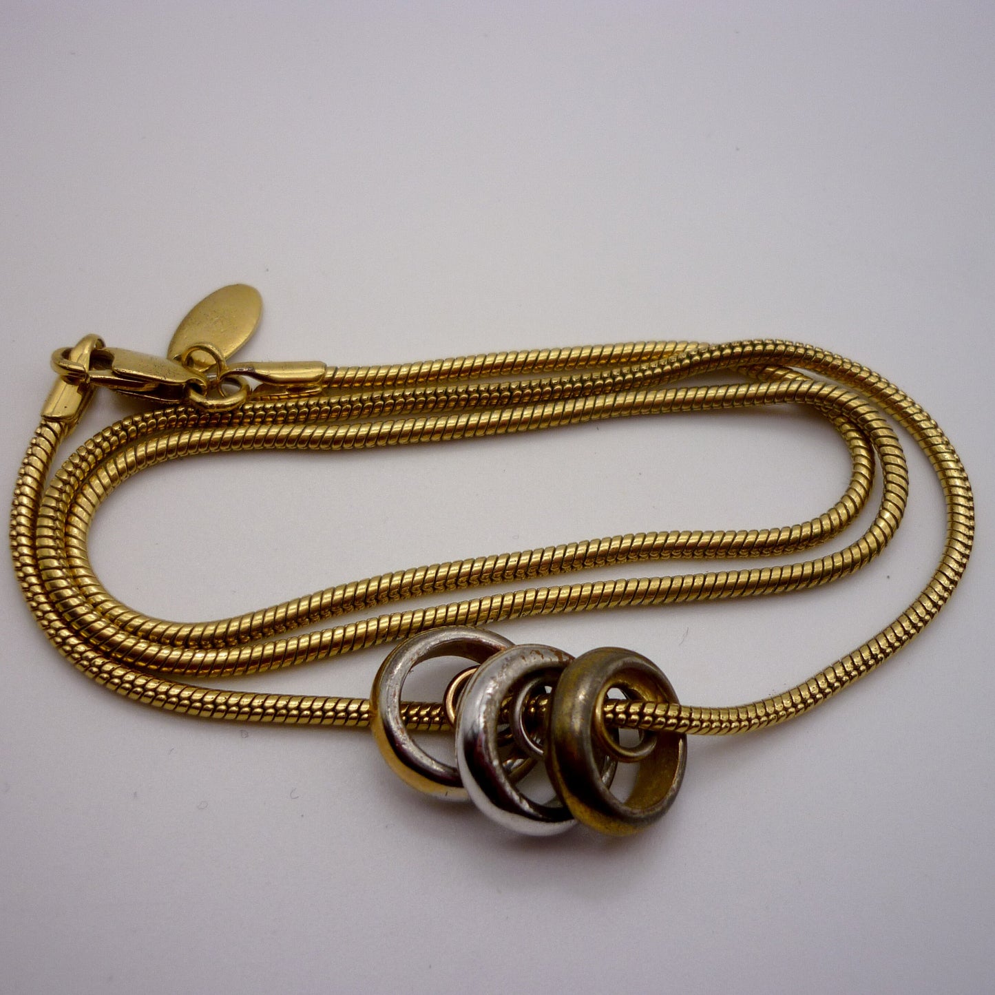 Vintage Gold Tone Snake Chain with Bronze, Silver and Gold Ring Pendants