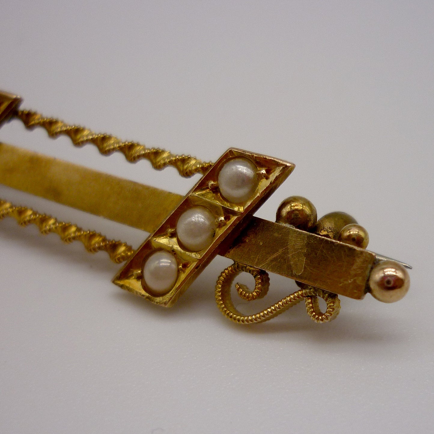 Antique Late Victorian Yellow Gold Bar Brooch set with Seed Pearls