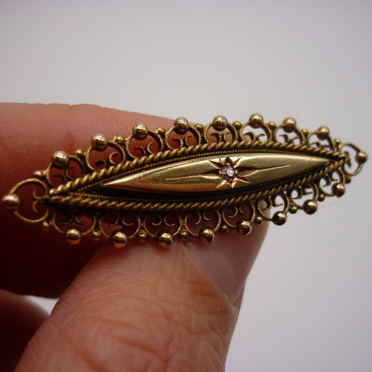 Antique Navette Gold Brooch With Star Set Diamond