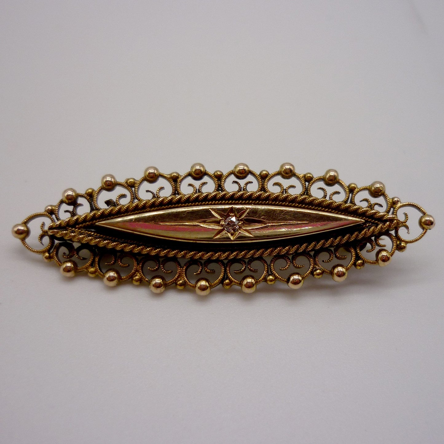 Antique Navette Gold Brooch With Star Set Diamond