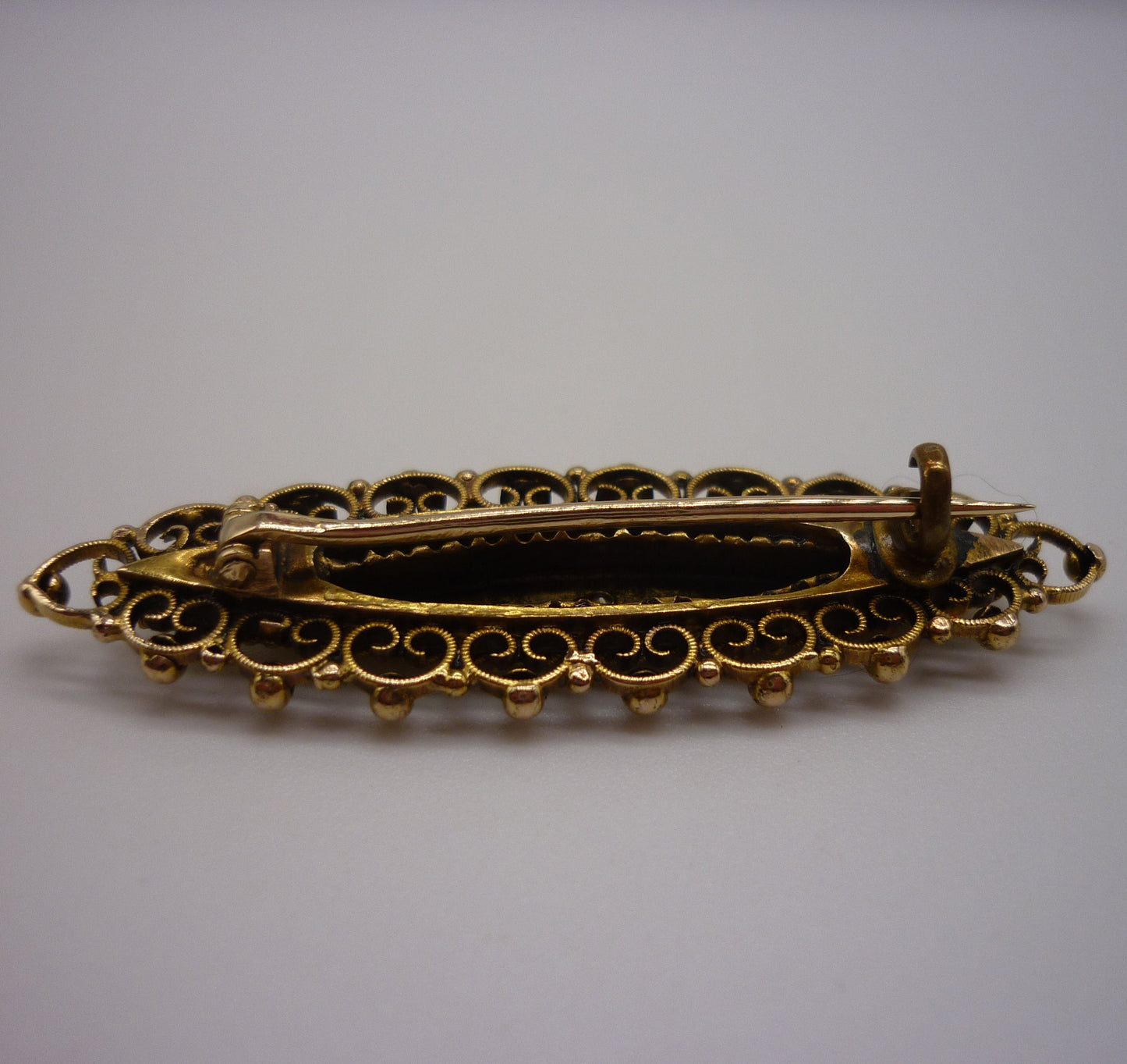 Antique Navette Gold Brooch With Star Set Diamond