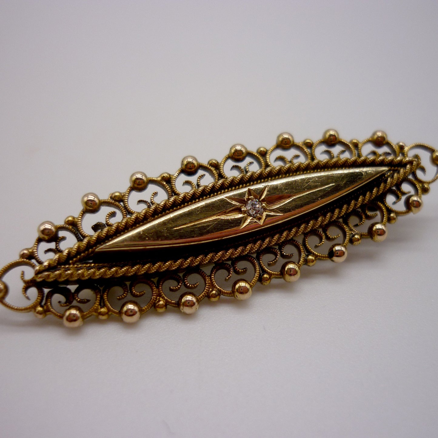 Antique Navette Gold Brooch With Star Set Diamond
