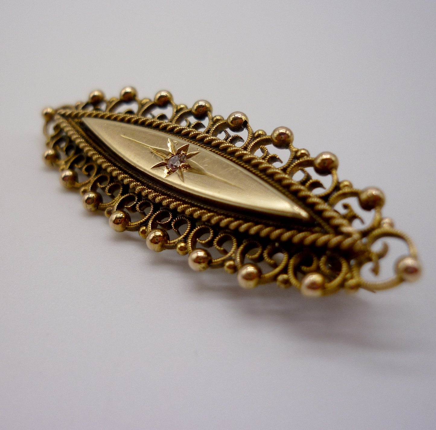 Antique Navette Gold Brooch With Star Set Diamond