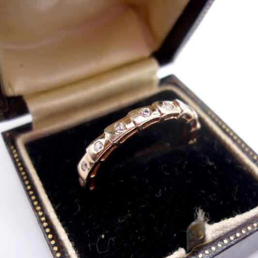 Rose Gold Plated Silver Ring In Ridged Step Pattern Set With Small White Stones