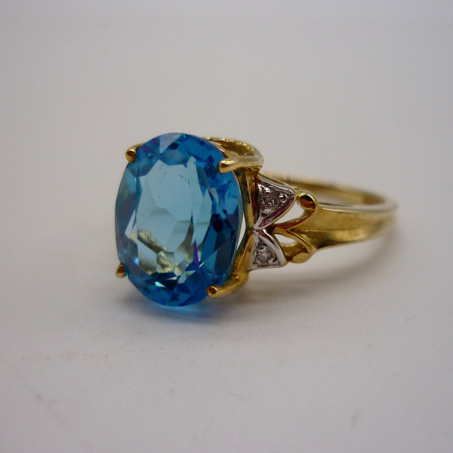 Vintage Swiss Blue Topaz 9k Gold Ring with Diamond Accents, Size 6.75