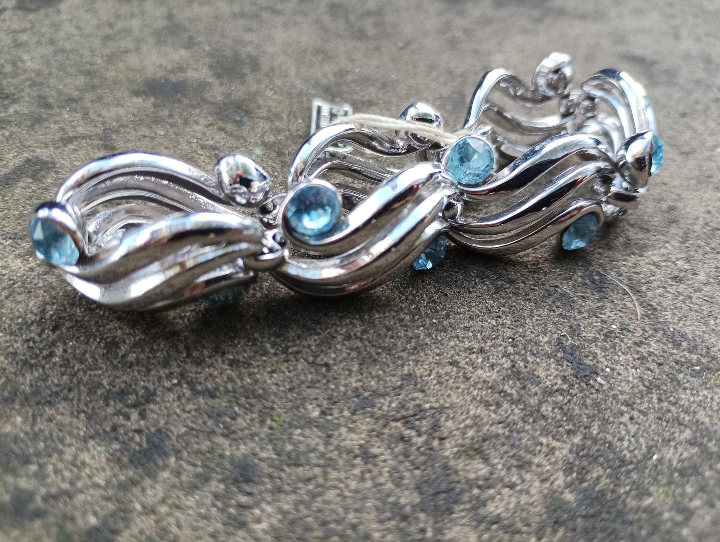 Vintage Crown Trifari Bracelet: Silver Plated Wave Link with Baby Blue Rhinestones