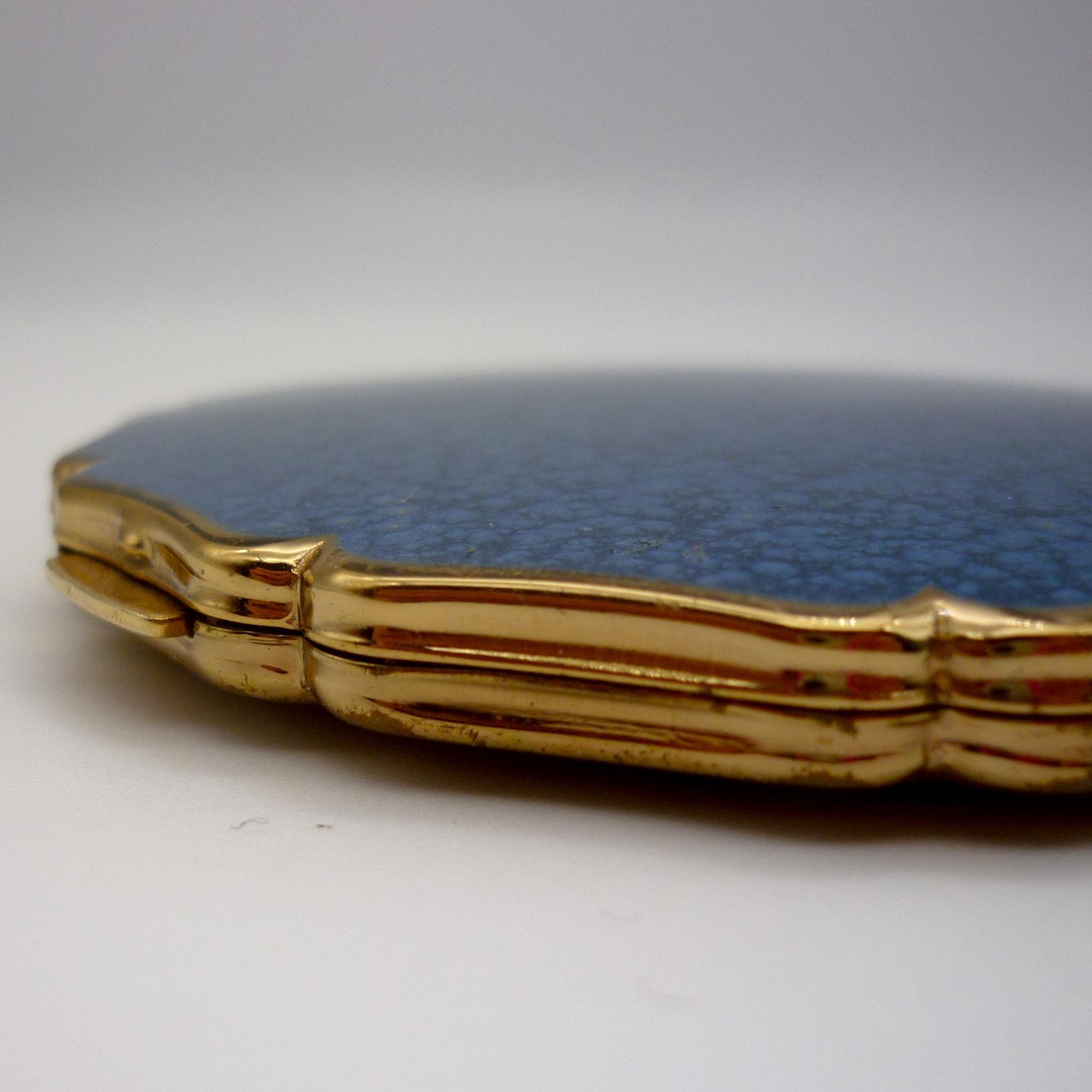 Vintage Stratton Compact in Hand with Blue Enamel Lid