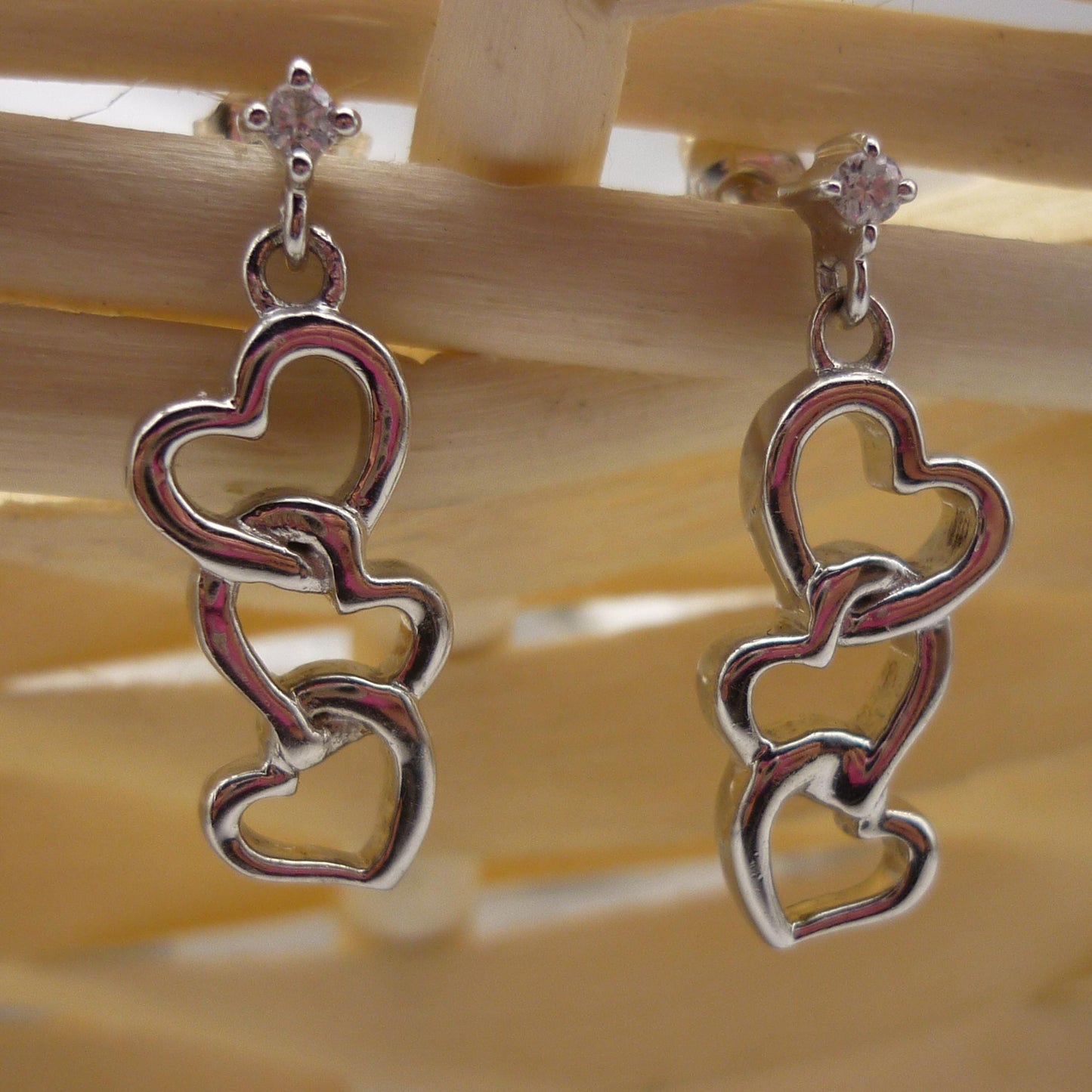Sterling Silver Dangle Interlocking Heart Earrings with Small Zircon Studs