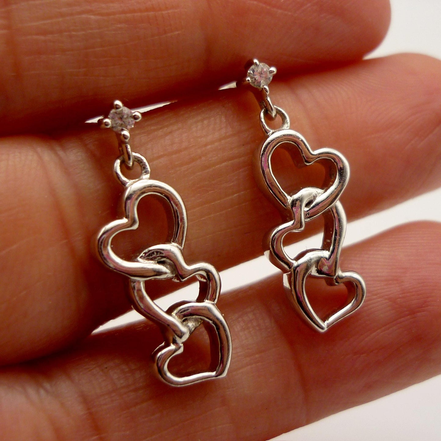 Sterling Silver Dangle Interlocking Heart Earrings with Small Zircon Studs