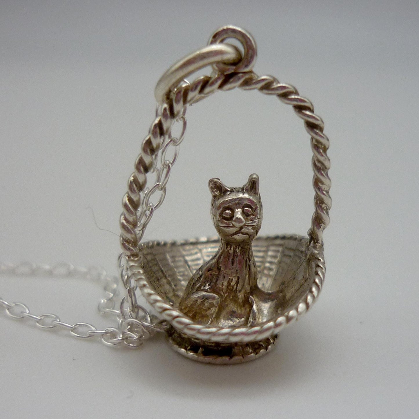 Silver Cat in a Basket Charm Necklace