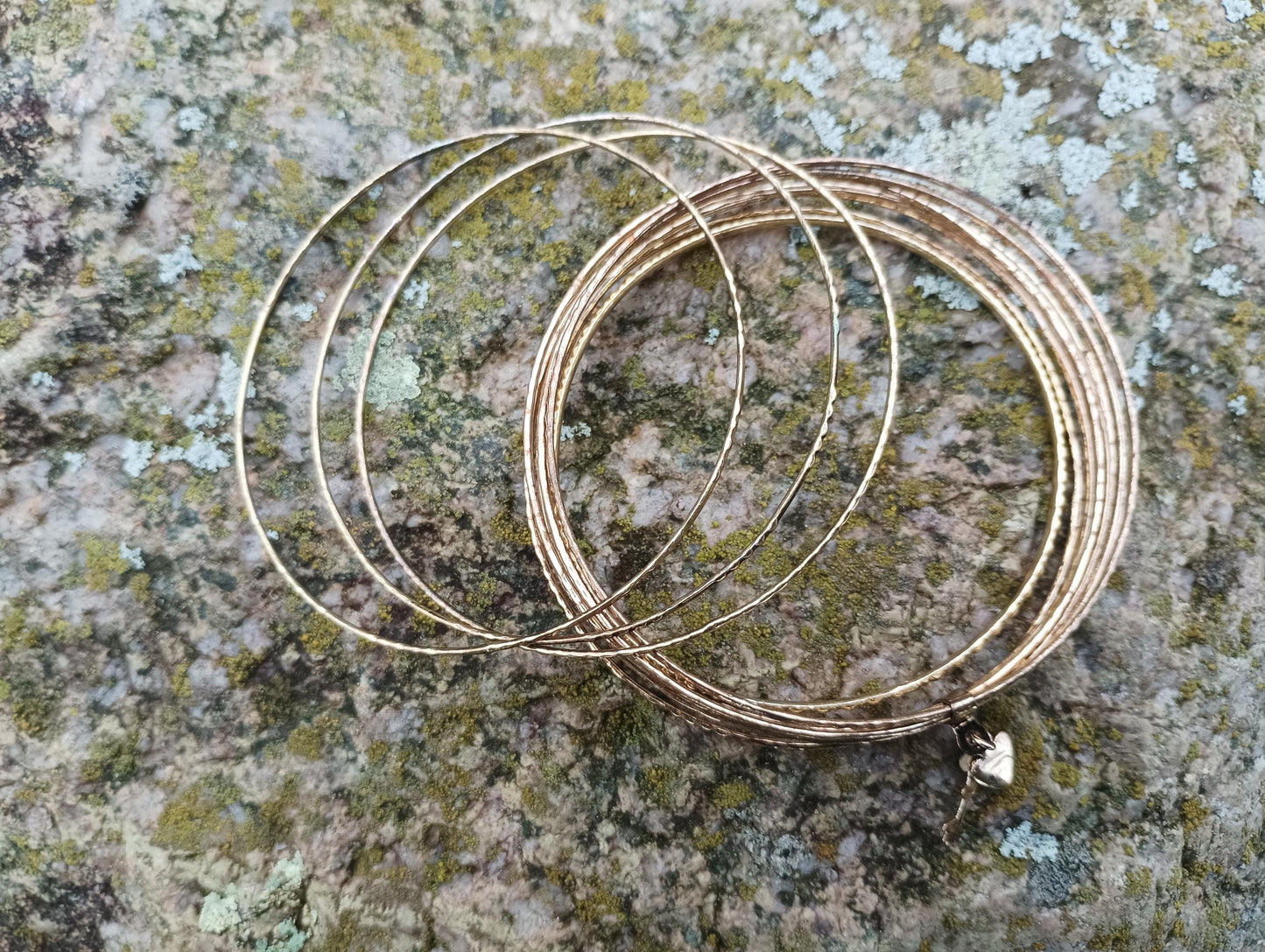 Set of Thin Gold Tone Metal Bangles For Women